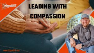 A compassionate leader connects with team members, showcasing empathy and understanding in leadership.