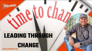 A visionary leader navigates through the challenges of change, symbolizing effective leadership during transitions.