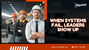 Fleet leader standing by truck, showing leadership in a system failure.