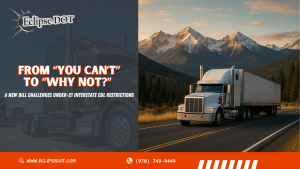 Semi truck driving through Colorado mountains on an interstate highway.