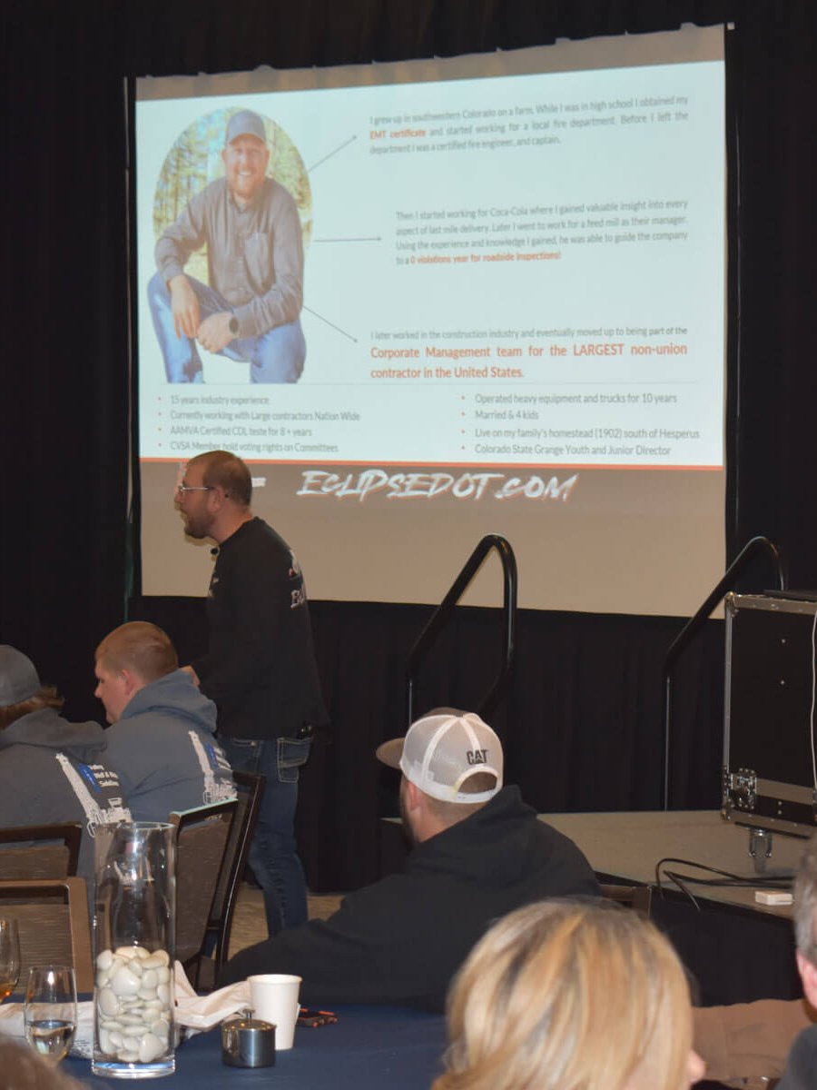 dan speaking at event with drivers