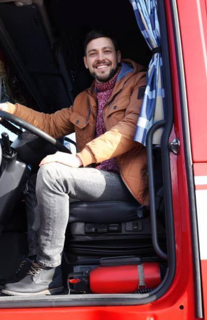 driver in a red truck